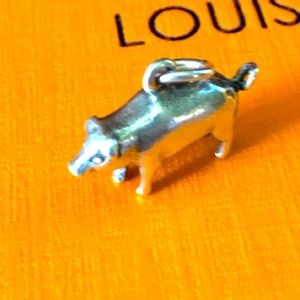 Pig charm for a bracelet or a chain, it’s 925 silver stamped.